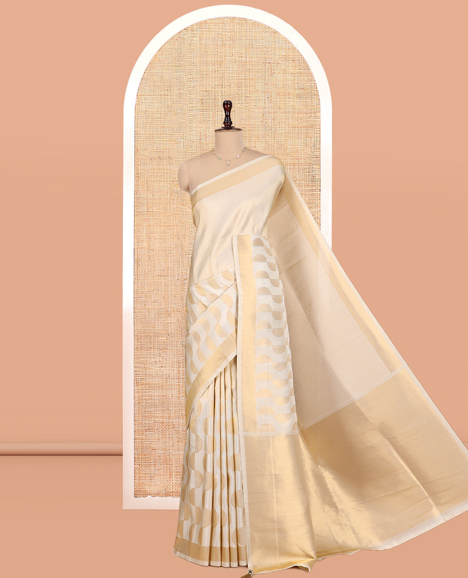 Gold Tissue Saree Adorned with Zari Stripes and Geometric Designs, a Zari Border, a Matching Blouse