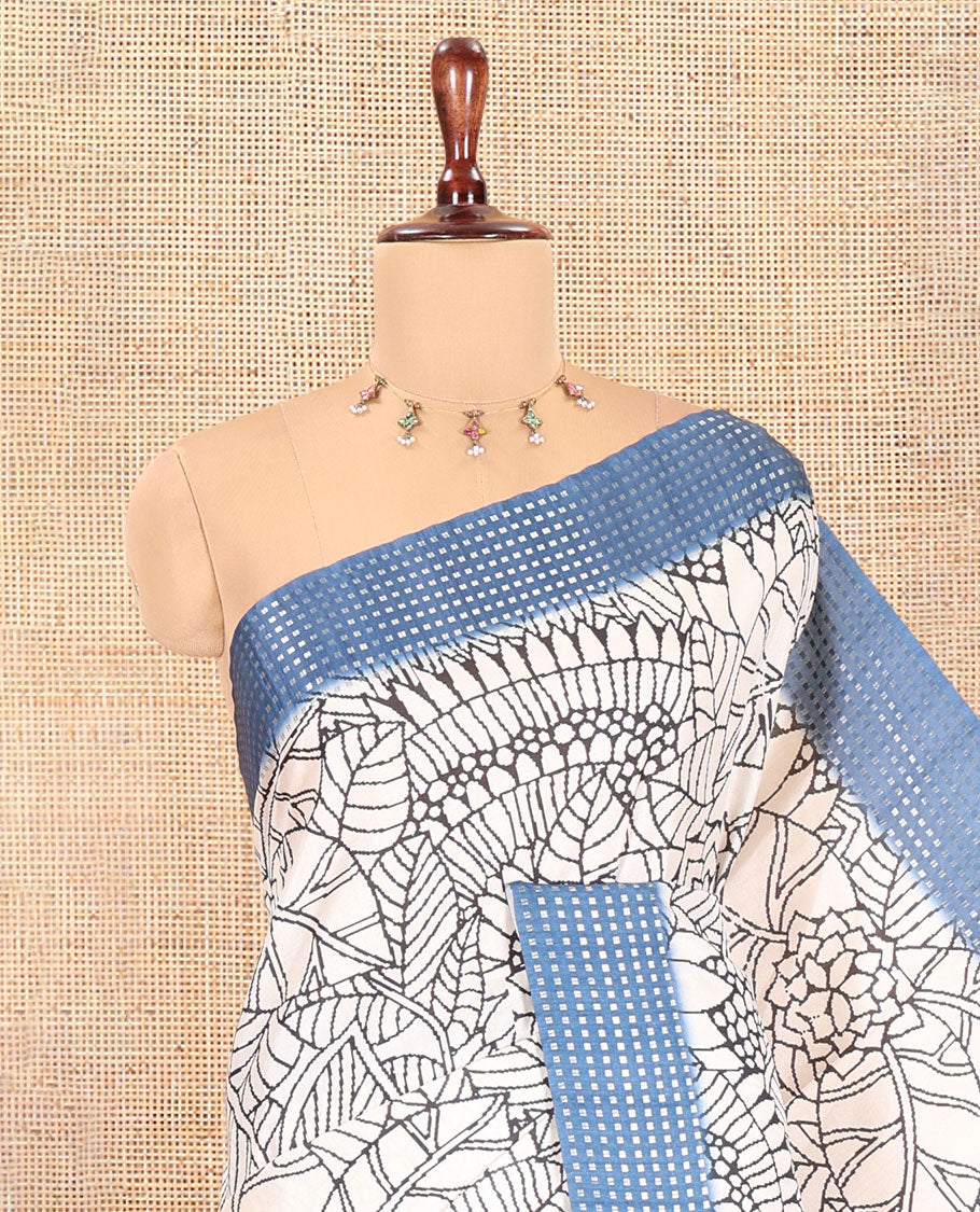 Cream-Steel Blue Dola Silk Saree, Adorned with Floral Print, a Contrast Checked Border, Pallu of Buttas, and a Contrast Blouse