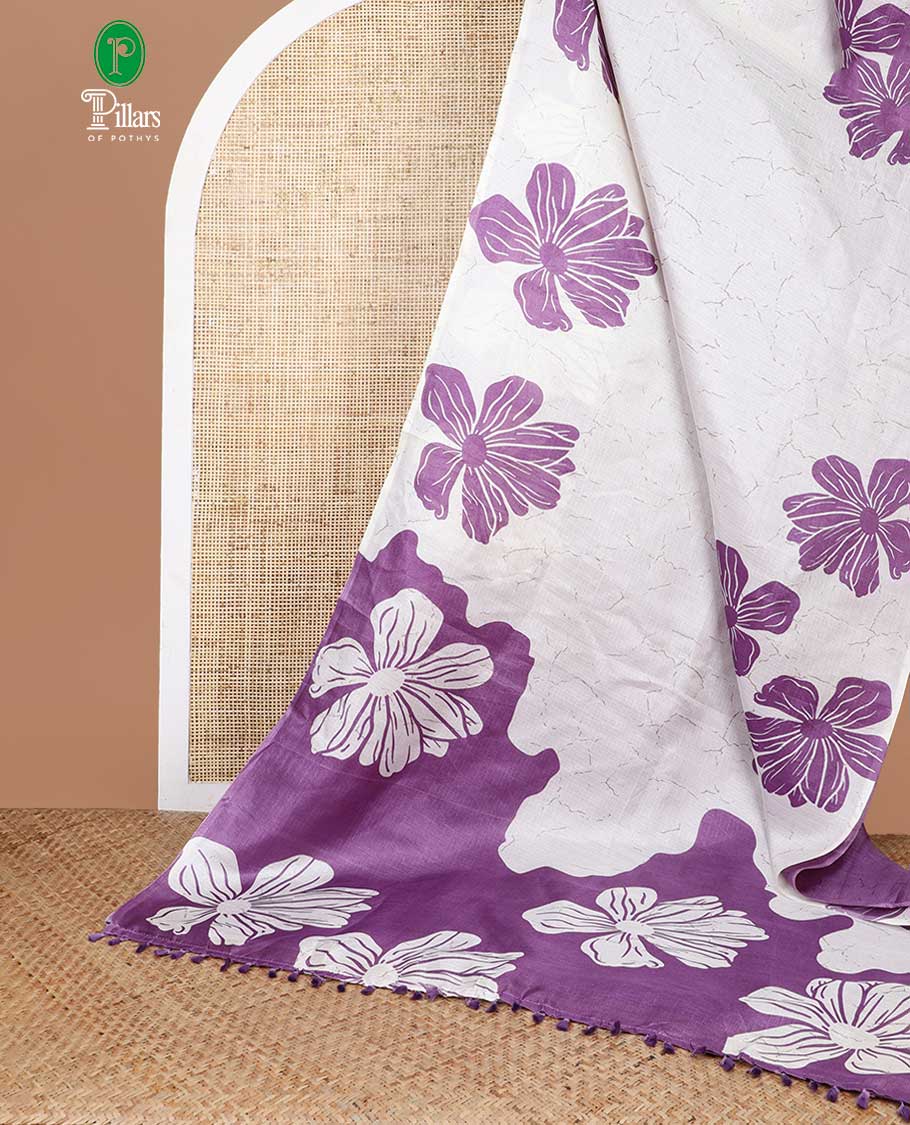 Purple floral design khadi silk saree with self border & solder pallu along with plain blouse