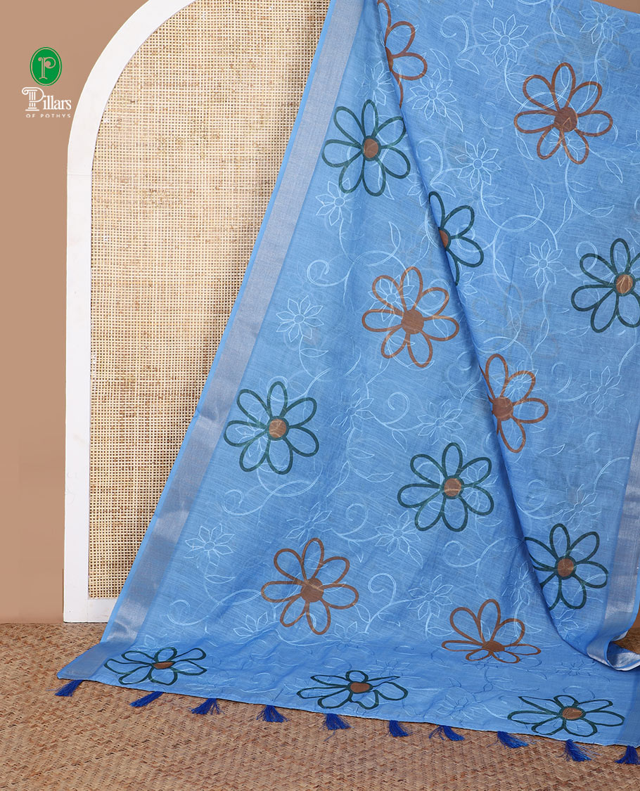 Blue floral buttas embroidery linen saree with bhavanji border & self pallu along with butta printed blouse