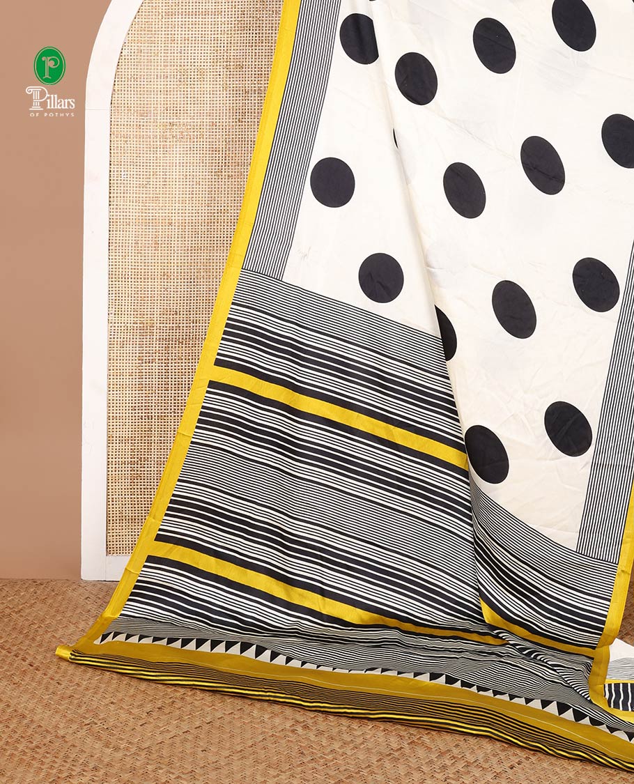 Cream with mehandi green polka dot printed design gajji silk saree with contrast piping border & printed pallu along with striped blouse
