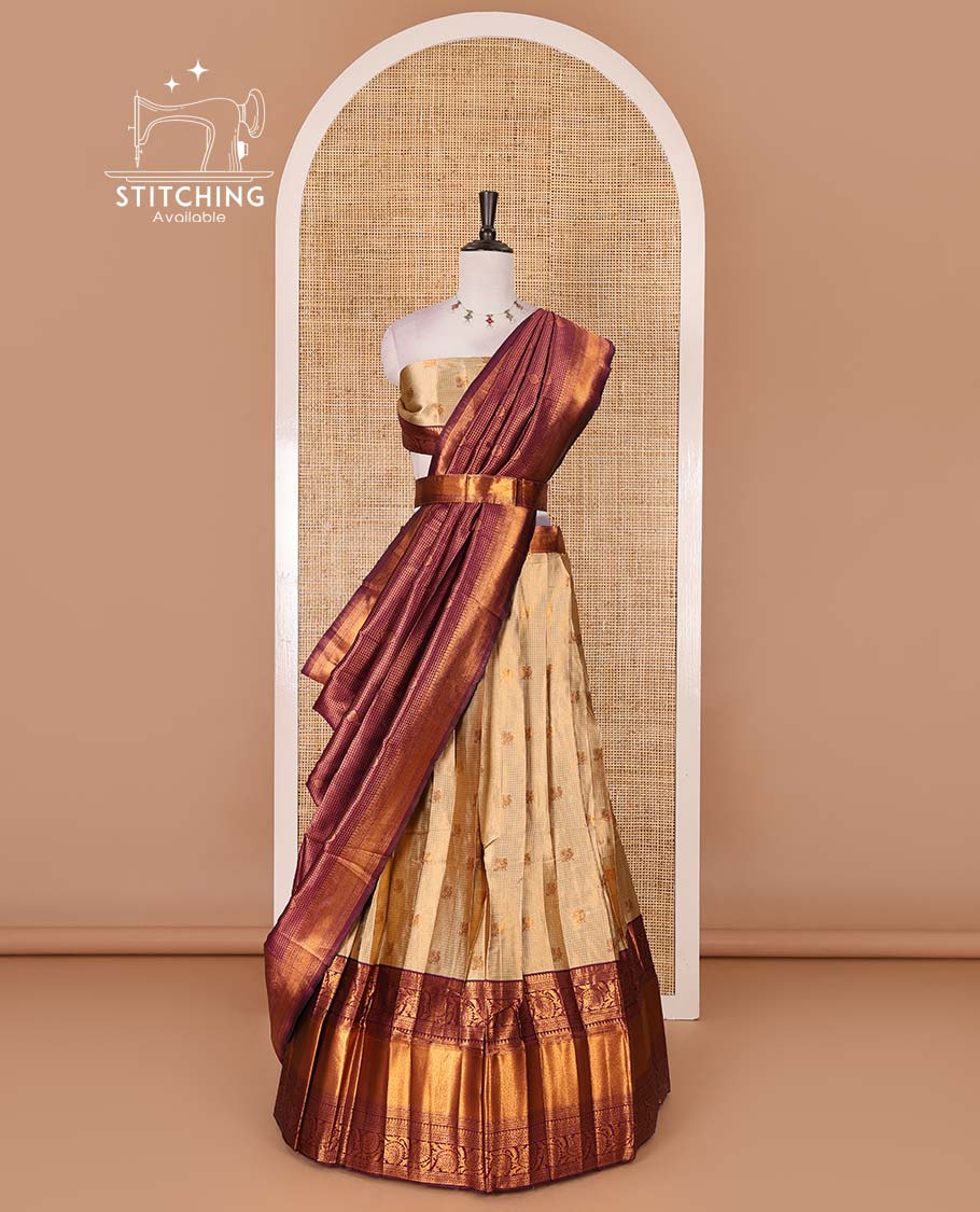 Gold banaras half saree, zari buttas with contrast wine traditional zari border skirt, matching blouse, dhavani of zari checks, and buttas