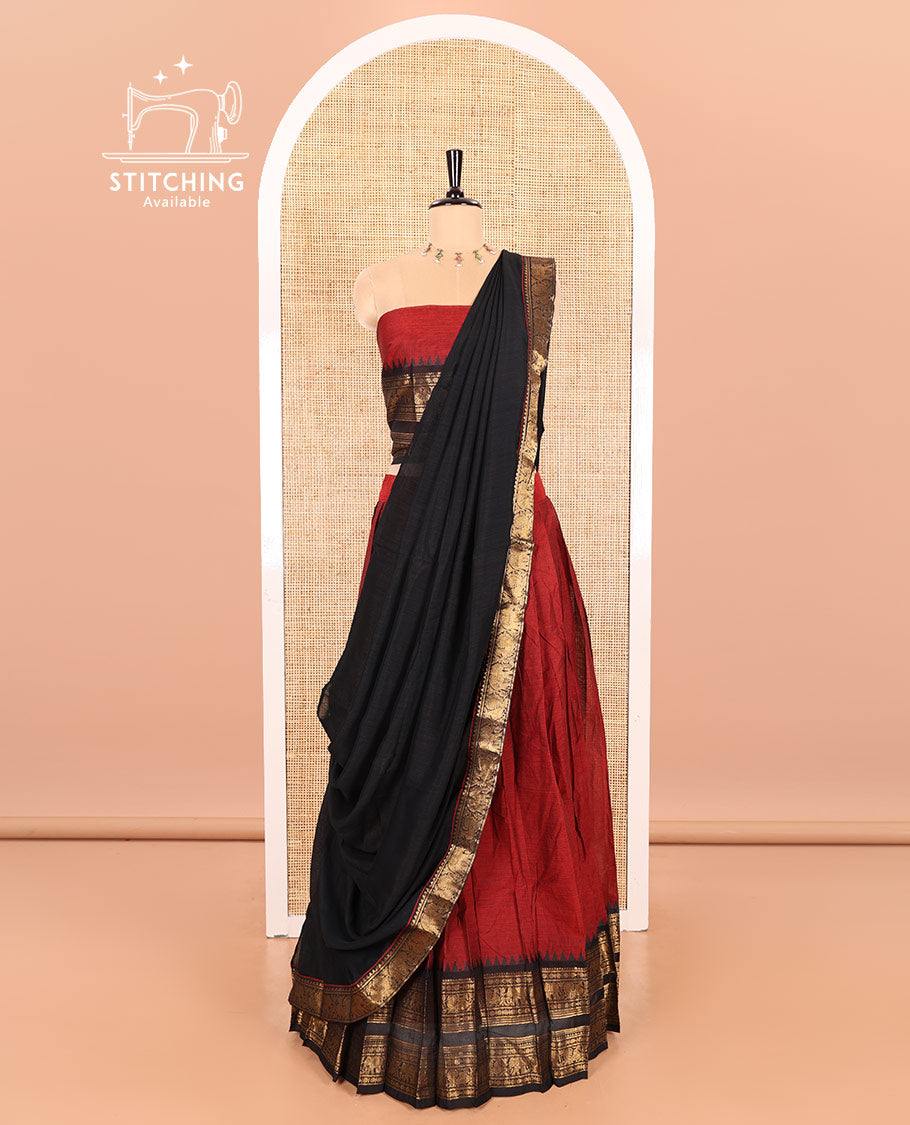 Maroon-Black Chettinad Cotton Half-Saree Featuring a Plain Skirt, Highlighted with a Contrast Peacock-Elephant Motifs Woven Rettai Pettu Zari Border, a Subtly Woven Matching Blouse, and a Vichitra Silk Contrast Traditional Zari-Bordered Dhavani