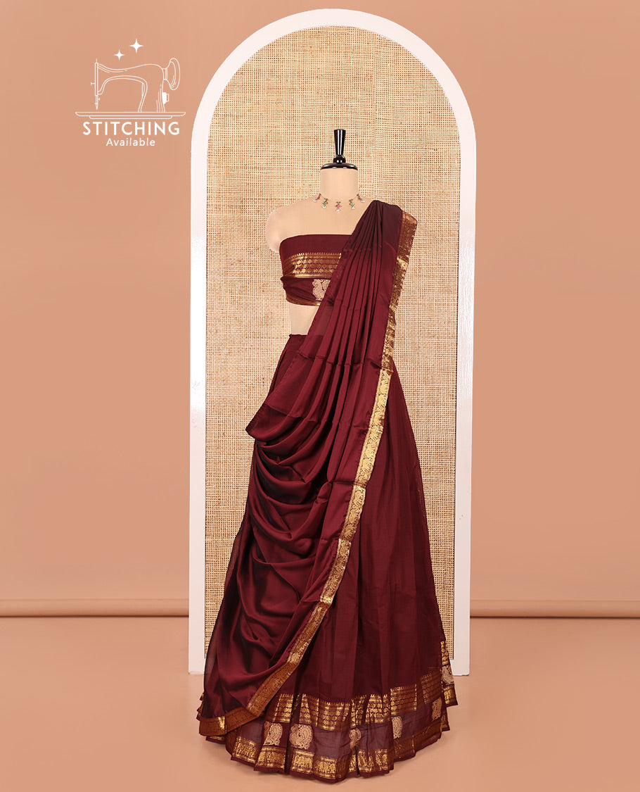 Maroon Chettinad Cotton Half-Saree Featuring Plain Skirt, Elevated with a Contrast Traditional Zari Border of Peacock Designs, Paired with a Matching Blouse, and a Satin Georgette Zari Bordered Dhavani