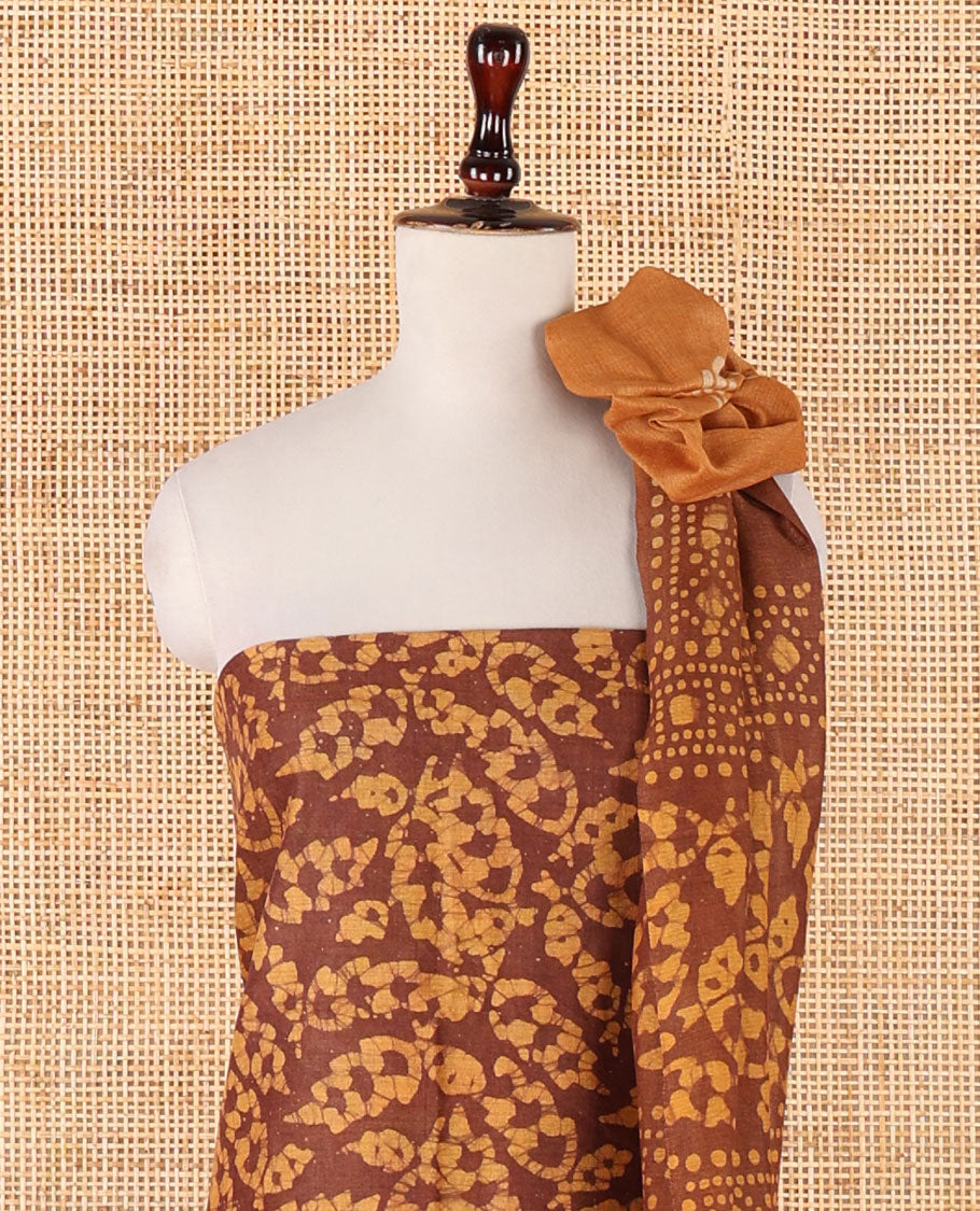 Mustard chudidhar material, leaf batik-print bhagalpuri cotton top,contrast batik-print bottom & dual-color printed mul-mul dupatta