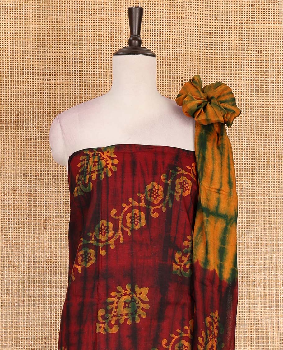 Maroon cotton material chudidar set, shibori with batik style floral printed top, contrast plain bottom, and dupatta of shibori and batik print