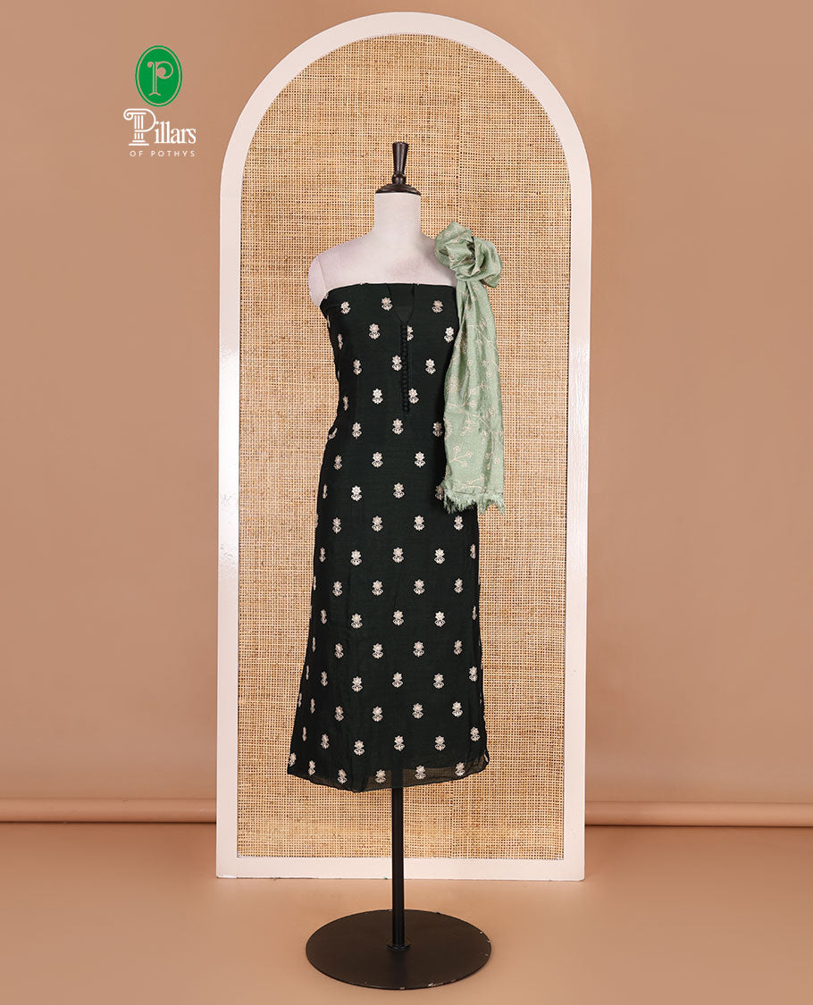 Dark green Vichitra silk material churidar set, floral motifs embroidered top, contrast Santoon bottom, and floral vine thread embroidered scallop dupatta