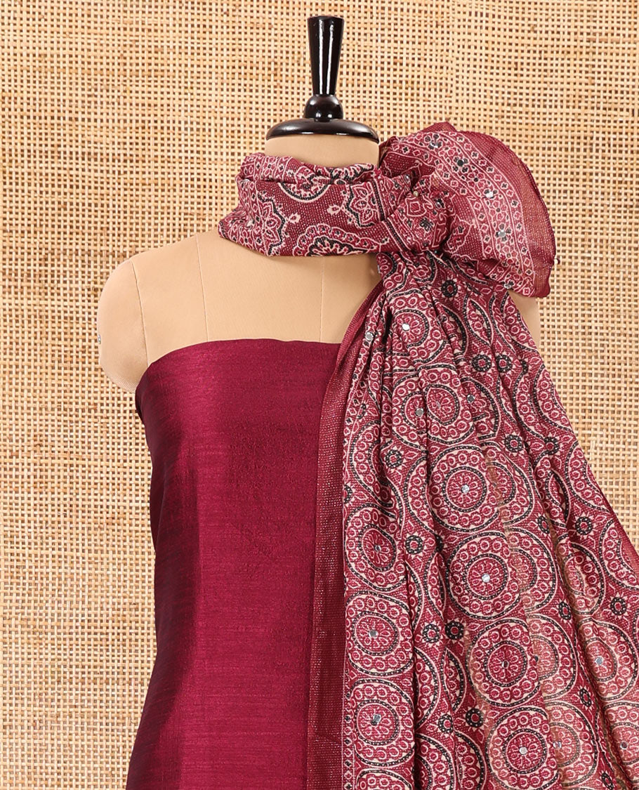 Magenta material chudidar set, plain Vichitra silk top, santoon bottom, and dupatta of Ajrakh print and mirror work
