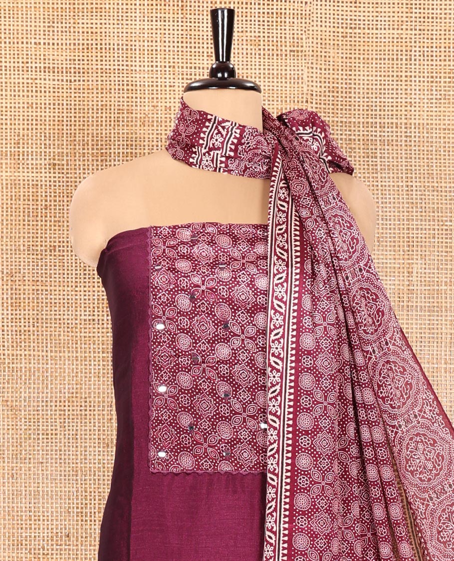 Magenta Material Chudidhar Set, Enriched with Ajrakh Patch Work and Mirror Work Vichitra Silk Top, Plain Santoon Bottom, and Chinon Silk Dupatta Featuring Intricate Ajrakh Prints