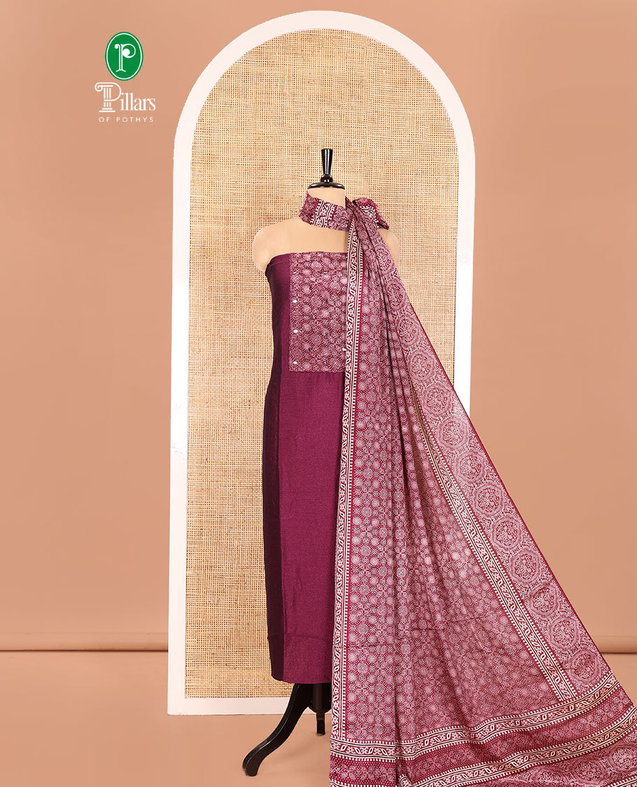 Magenta Material Chudidhar Set, Enriched with Ajrakh Patch Work and Mirror Work Vichitra Silk Top, Plain Santoon Bottom, and Chinon Silk Dupatta Featuring Intricate Ajrakh Prints