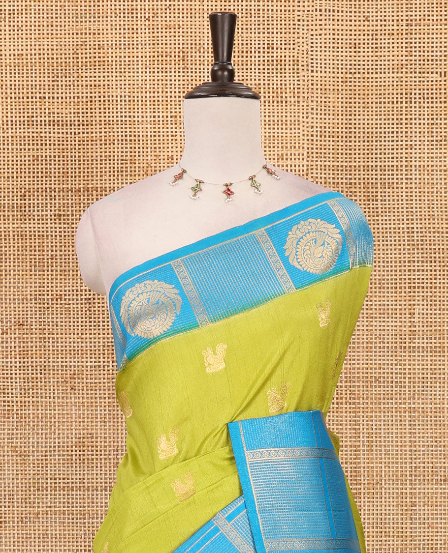 Parrot green peacock buttas dola silk saree, contrast kanchipuram-style traditional zari border, zari pallu & contrast zari border blouse