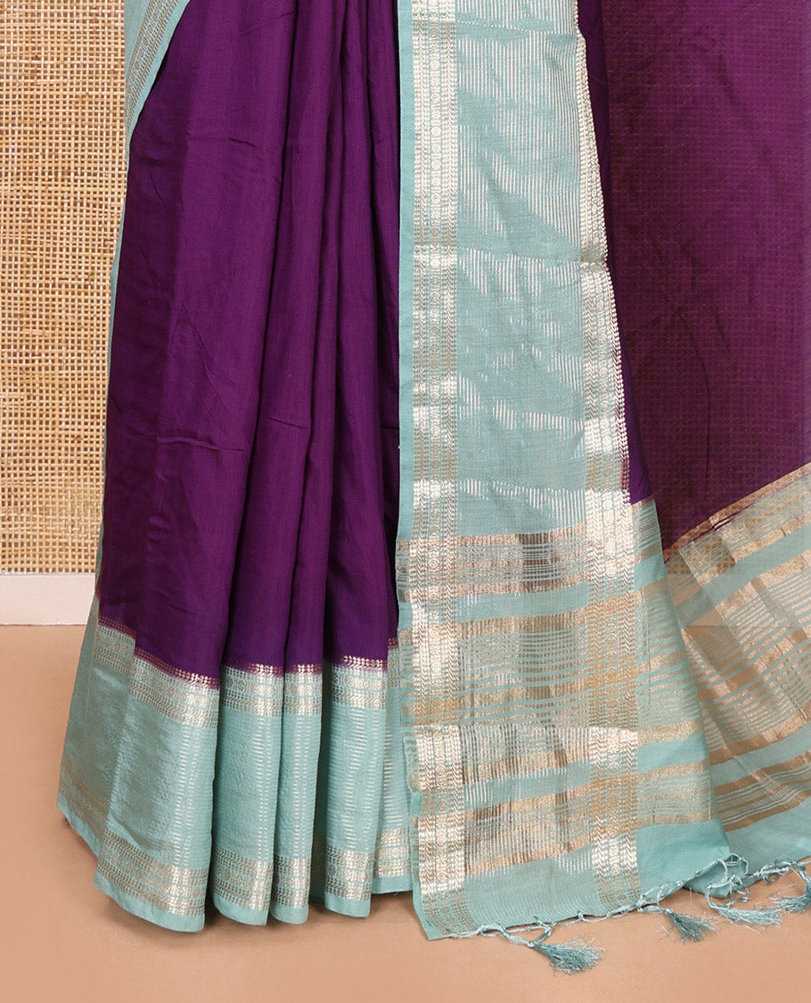Purple plain Assam silk saree, contrast traditional zari border of rudraksham motifs, zari striped pallu, and a contrast zari bordered blouse