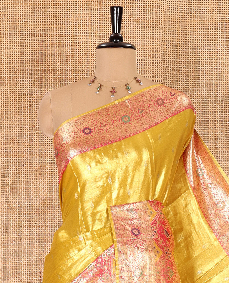 Mustard zari buttas tissue silk saree, contrast border of patola design and traditional motifs, jaal pallu, and a matching blouse