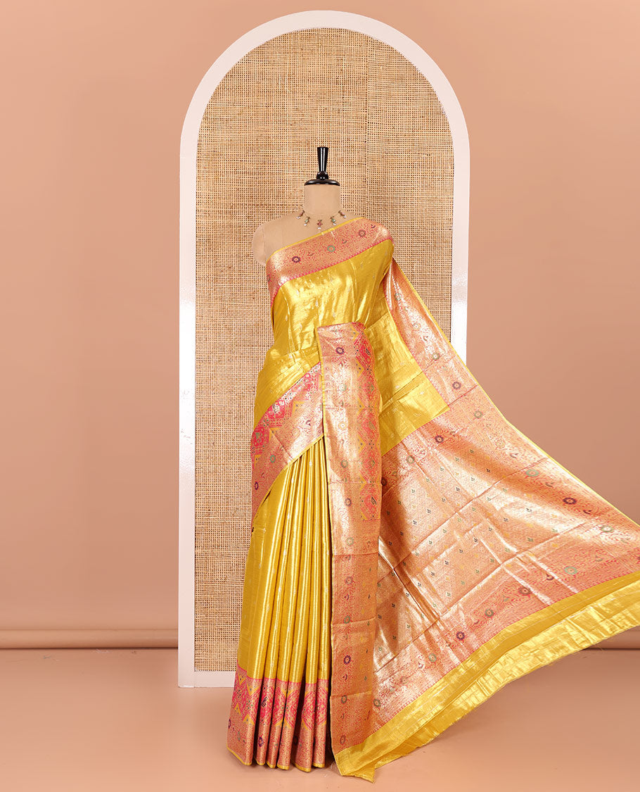 Mustard zari buttas tissue silk saree, contrast border of patola design and traditional motifs, jaal pallu, and a matching blouse