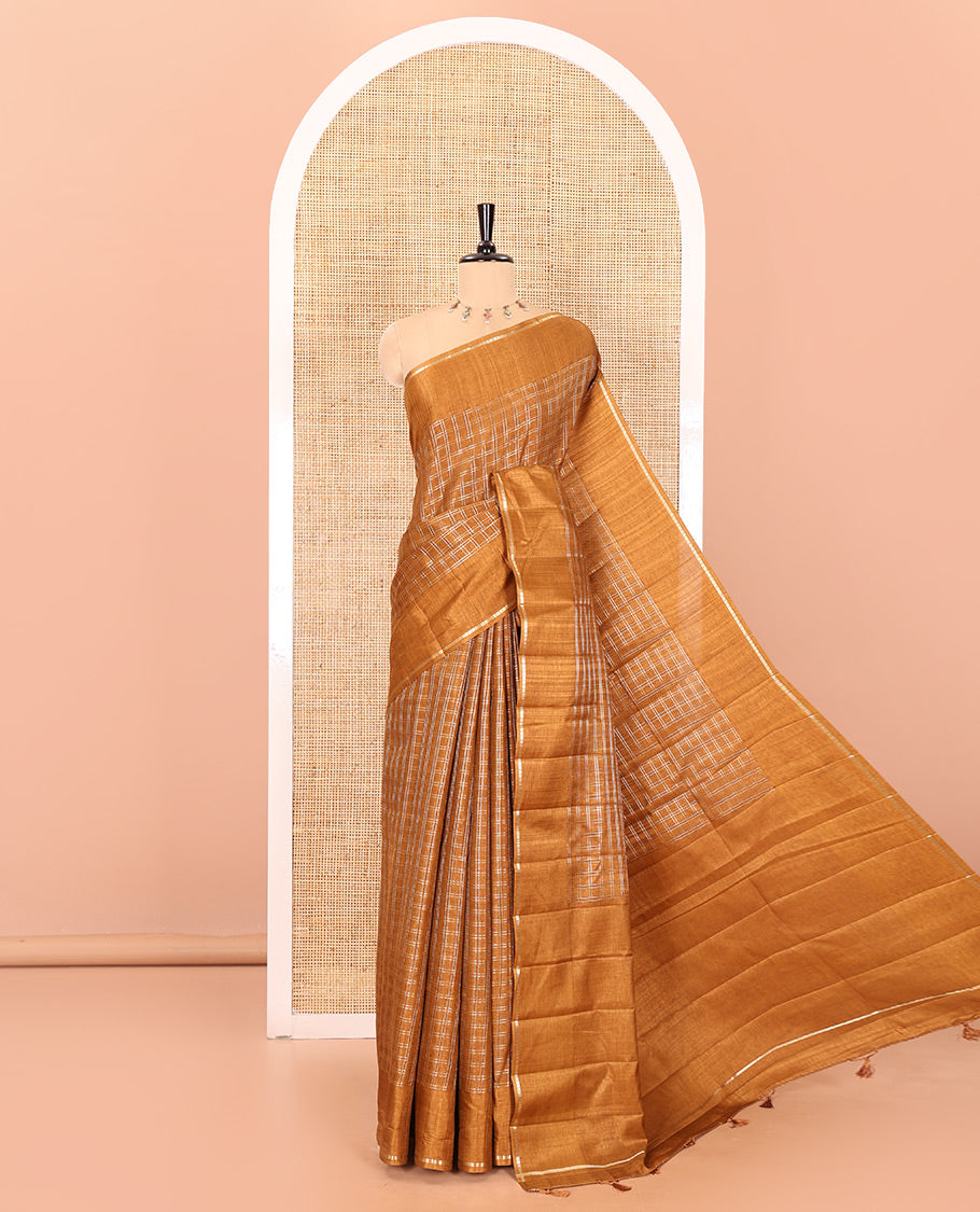 Golden brown zari checked fancy tussar silk saree, zari striped border, plain pallu, and a matching blouse