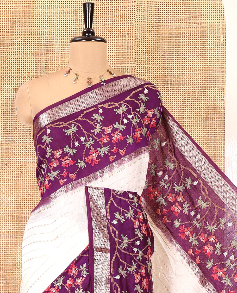 Off-White Assam Silk Saree Featuring Horizontal Zari Stripes, Contrast Floral Embroidered Border, Zari Striped Pallu, and Contrast Blouse