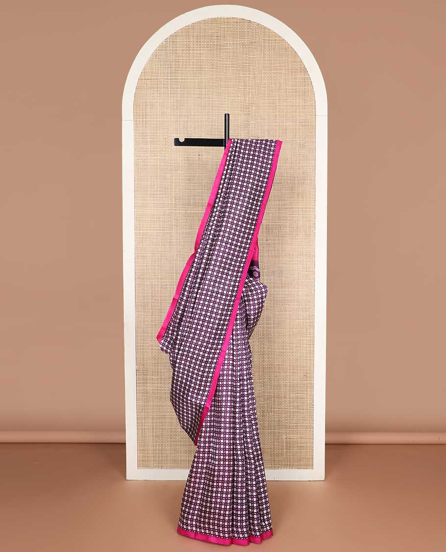 Cream checked printed silk saree with contrast border & floral design pallu
