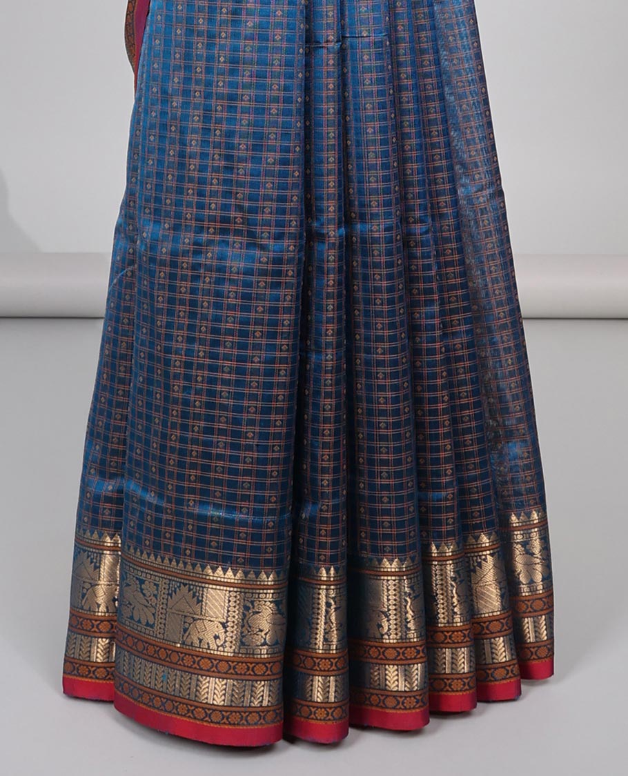 Blue motifs enclosed with checked cotton silk saree with self traditional zari design border & intricate zari design pallu