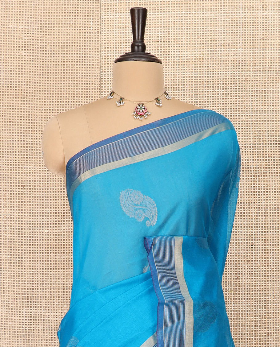 Blue Silk Cotton Saree Decked Up with Buttas All Over the Body, Complemented by a Contrast Zari Striped Border, Featuring a Contrast Pallu of Geometric Zari Designs, and Paired with a Contrast Blouse