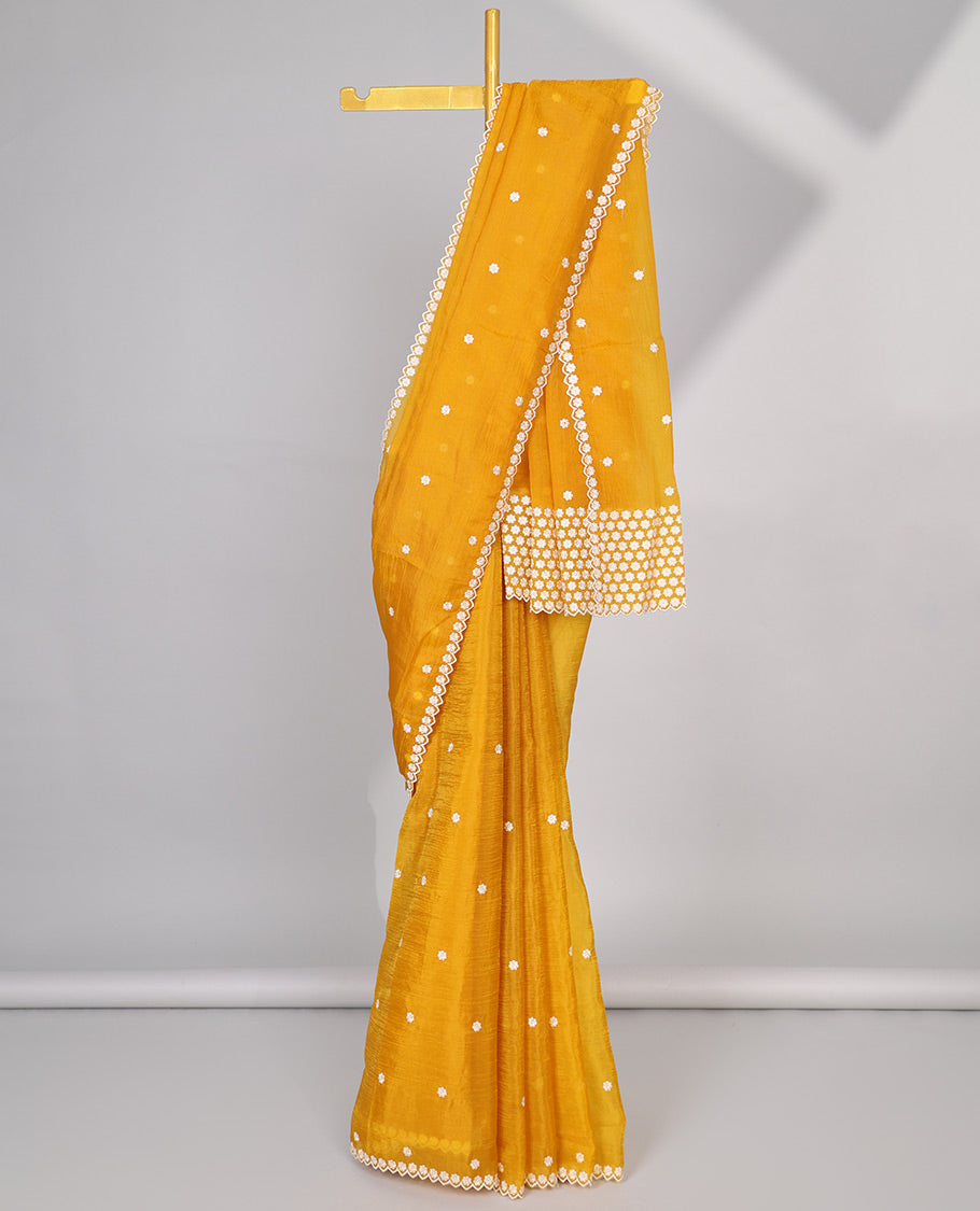 Pink Crushed Tissue saree with scallop motif border and intricate motif embroidery pallu