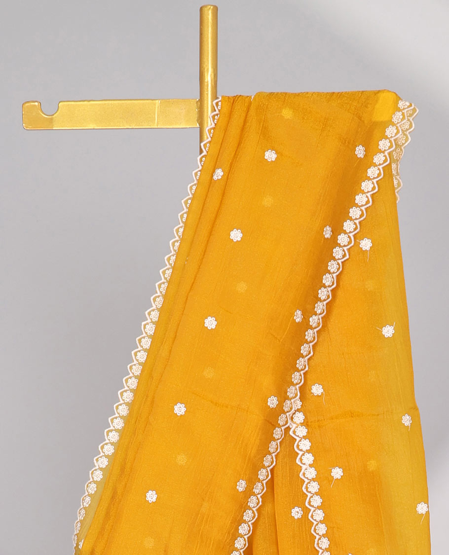 Pink Crushed Tissue saree with scallop motif border and intricate motif embroidery pallu