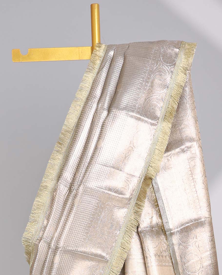 Beige checked , floral design tissue saree with self zari design & intricate zari design pallu