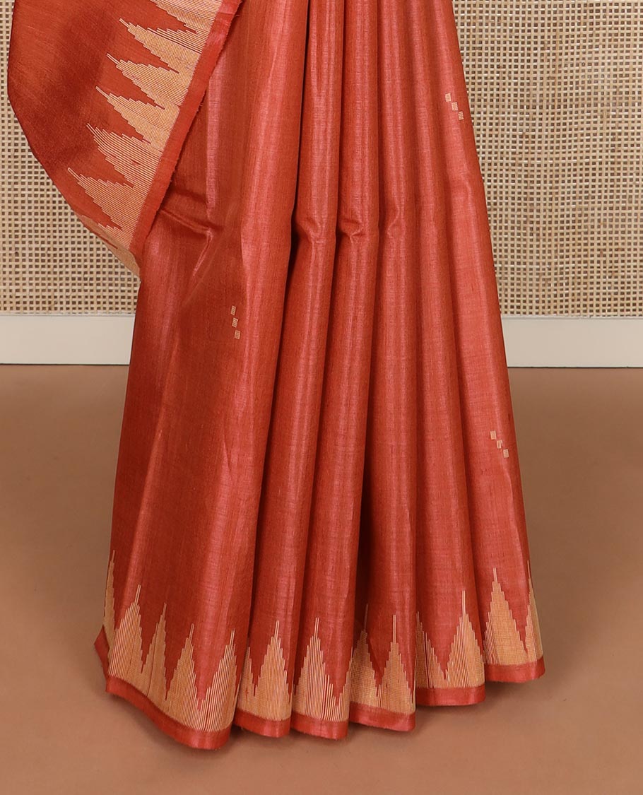 Orange buttas tussar silk saree, temple border and pallu of stripes and temple motifs