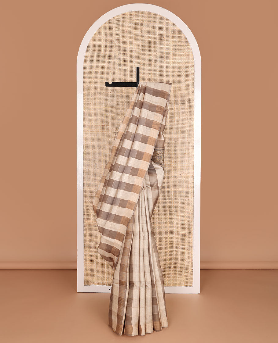 Borderless brown checked tussar saree, contrast paisley & ajrakh-style intricately printed pallu