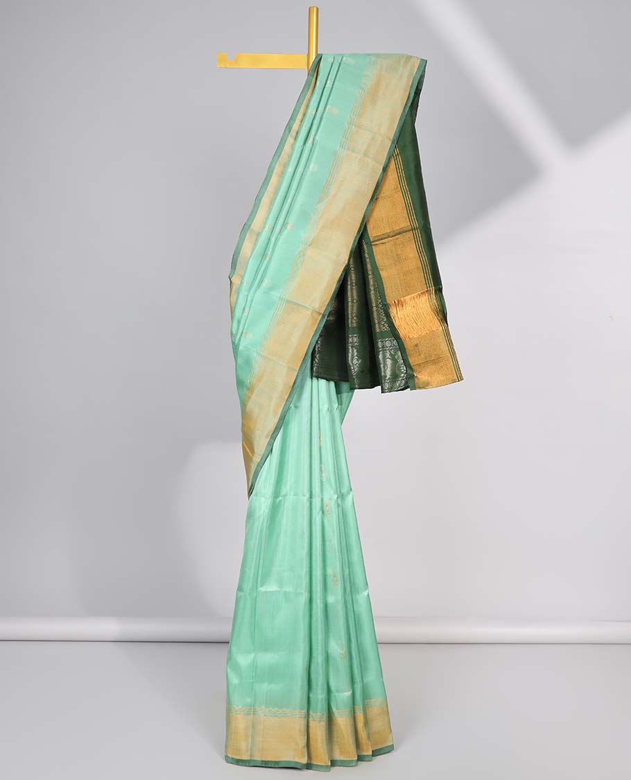 Green motifs uppada silk saree with contrast zari border & intricate floral zari design pallu