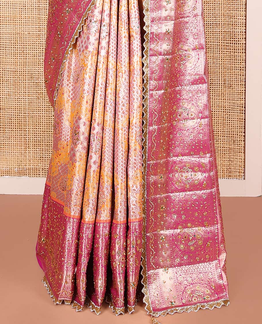 Orange Vastrakala Silk Saree, Gracefully Adorned with Floral Jacquard and Stone Work, Complemented by Contrast Zari and Stone-Embroidered Scallop Border, Grandly Zari and Stone Decked Up Pallu, and Paired with Contrast Embroidered Blouse