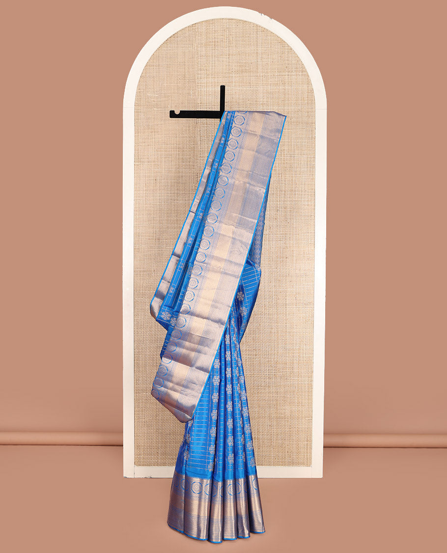 Blue Vasundhara Lite-Silk Mix Saree, Artfully Woven with Snowflake Buttas Enclosed Checks, Highlighted by Zari Border of Rekku, Chakram, Kathir, and Diamond Designs, Gleaming Jaal Pallu, and Paired with a Matching Blouse