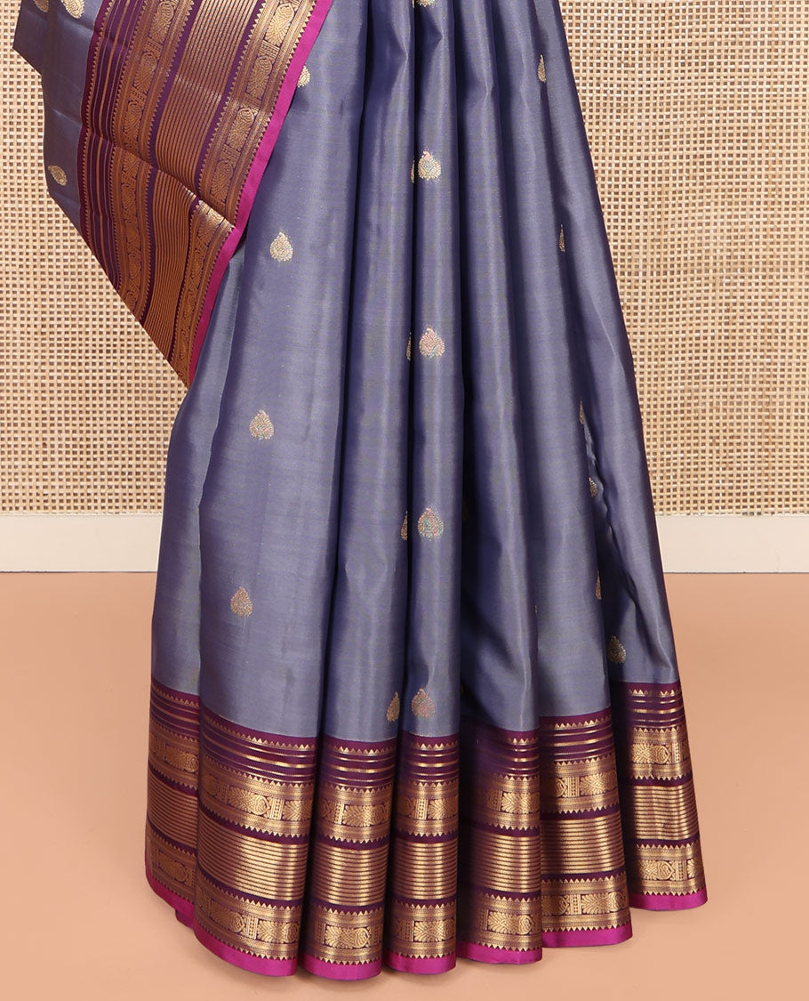 Grey Vasundhara Lite Silk Mix Saree, Elevated with Zari Buttas on Its Body, Complemented by Contrast Border of Rekku, Banaras, and Meen Designs, Grand Pallu Steeped with Paisleys, and Paired with a Contrast Blouse
