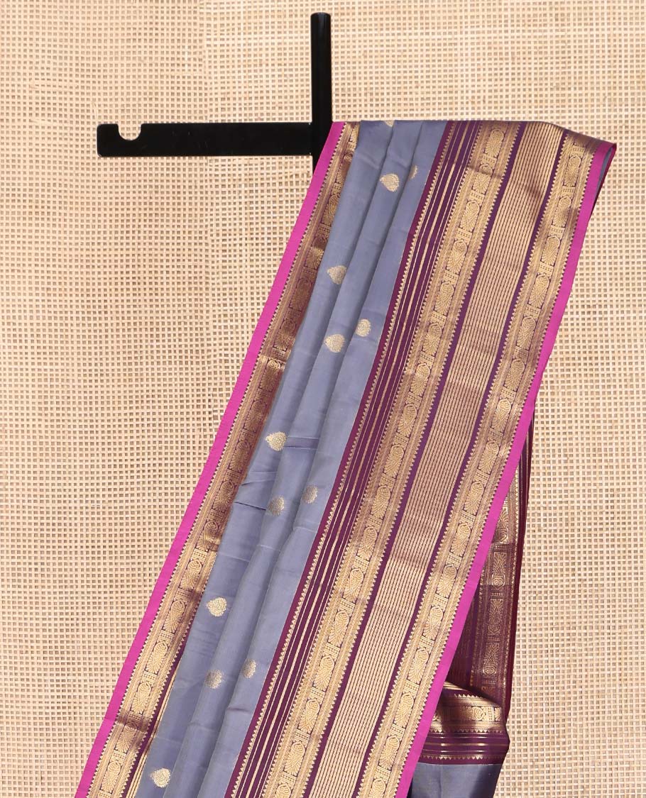 Grey Vasundhara Lite Silk Mix Saree, Elevated with Zari Buttas on Its Body, Complemented by Contrast Border of Rekku, Banaras, and Meen Designs, Grand Pallu Steeped with Paisleys, and Paired with a Contrast Blouse
