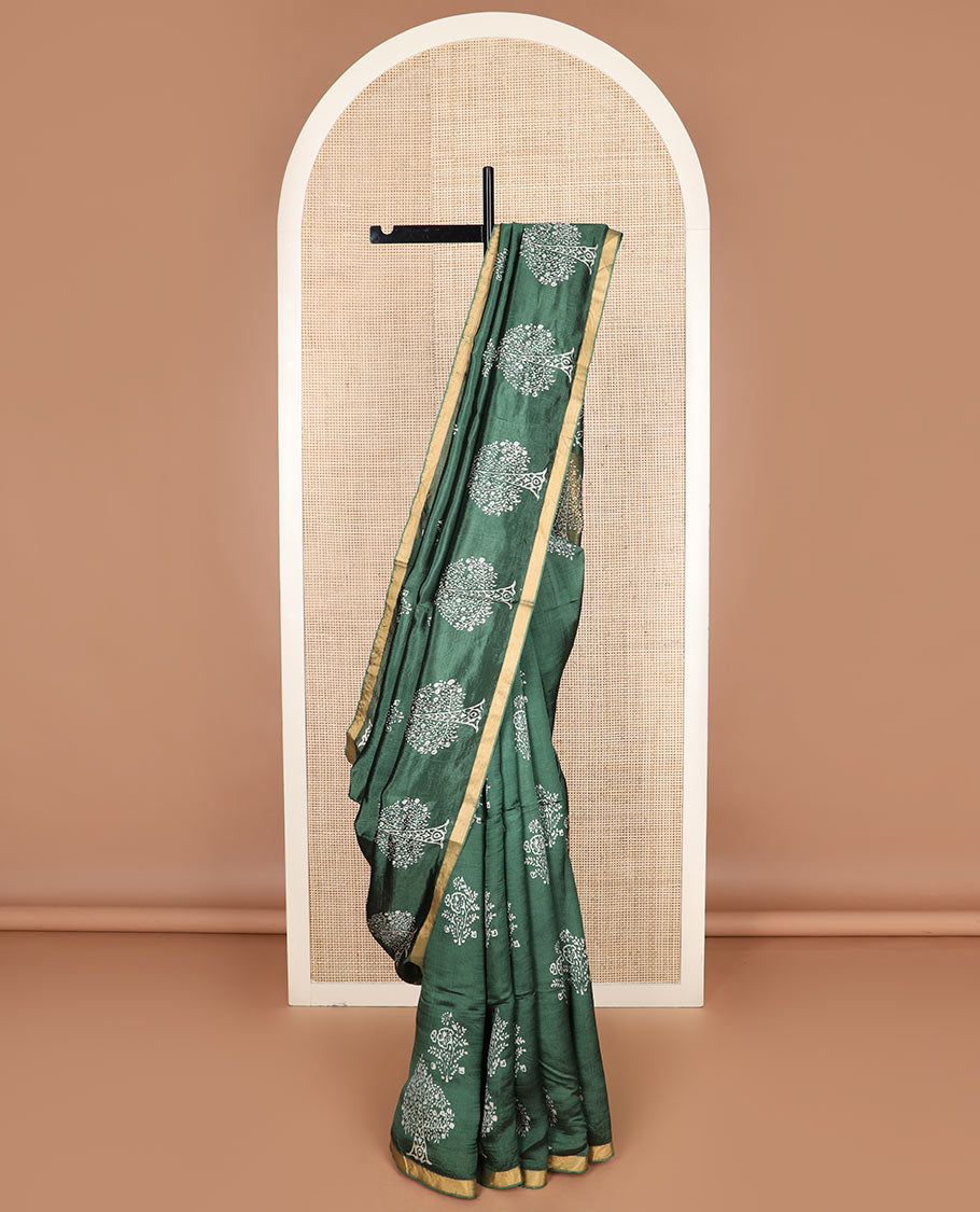 Green tree motifs printed banana pith saree, zari border, and floral printed pallu