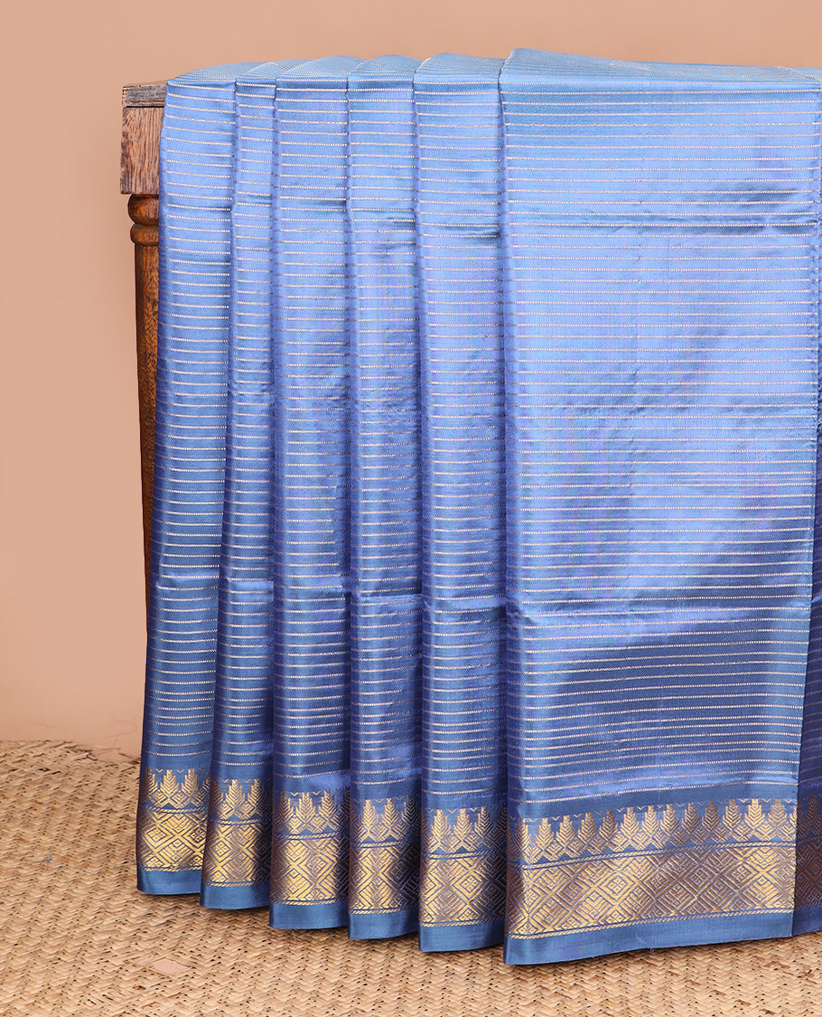Blue zari striped banana pith saree, traditional zari border, and contrast pallu of stripes