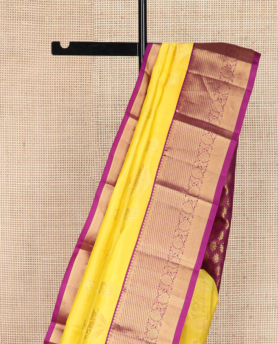 Yellow floral buttas silk saree, contrast border of salangai, ara bogudi, mayil kann & kodi visiry & seppu rekku pallu of floral motifs