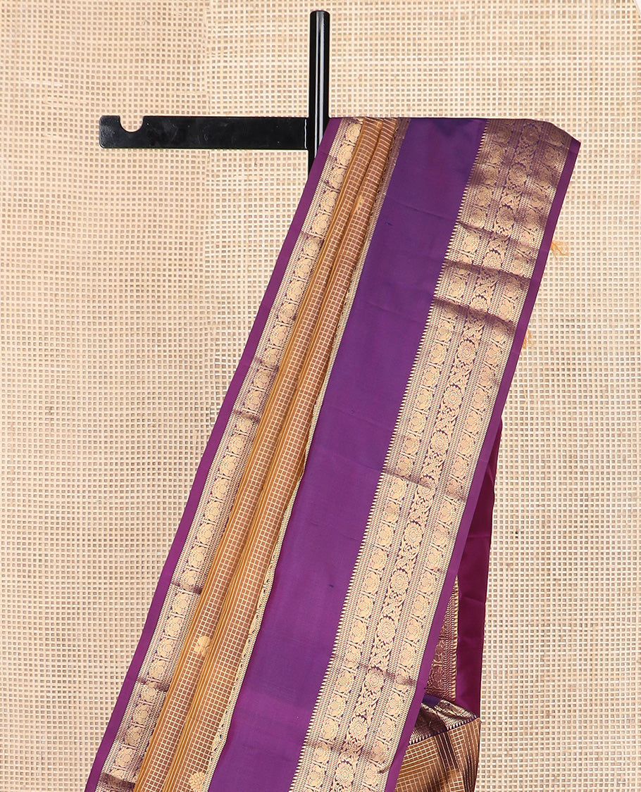 Brown micro-checked with annam chakram buttas silk saree, contrast rettai pettu border of ara bogudi, muthu, banaras,iruthalai pakshi and poo chakram, and jaal design pallu