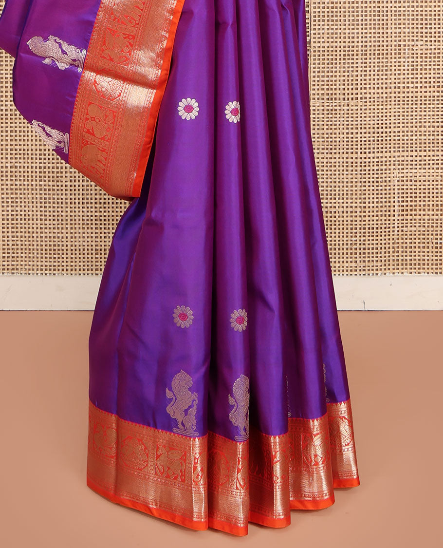 Purple Vasundhara Silk Saree, Embellished with Meena Buttas and Singam Buttas All Over Its Body, Complemented by Contrast Border of Rekku, Banaras, Yaanai, Mayil, and Vanki Designs, Pallu of Muthu Designs, and Paired with a Contrast Blouse