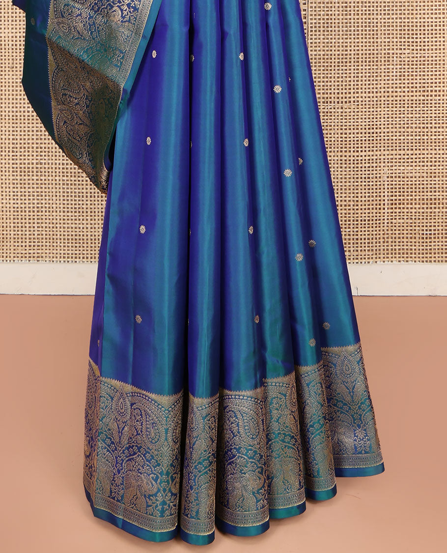 Blue Vasundhara Silk Saree, Accentuated with Zari Buttas All Over Its Body, Highlighted by a Zari Border of Manga and Yaanai Designs, Grand Geometric Patterned Pallu, and Paired with a Matching Blouse