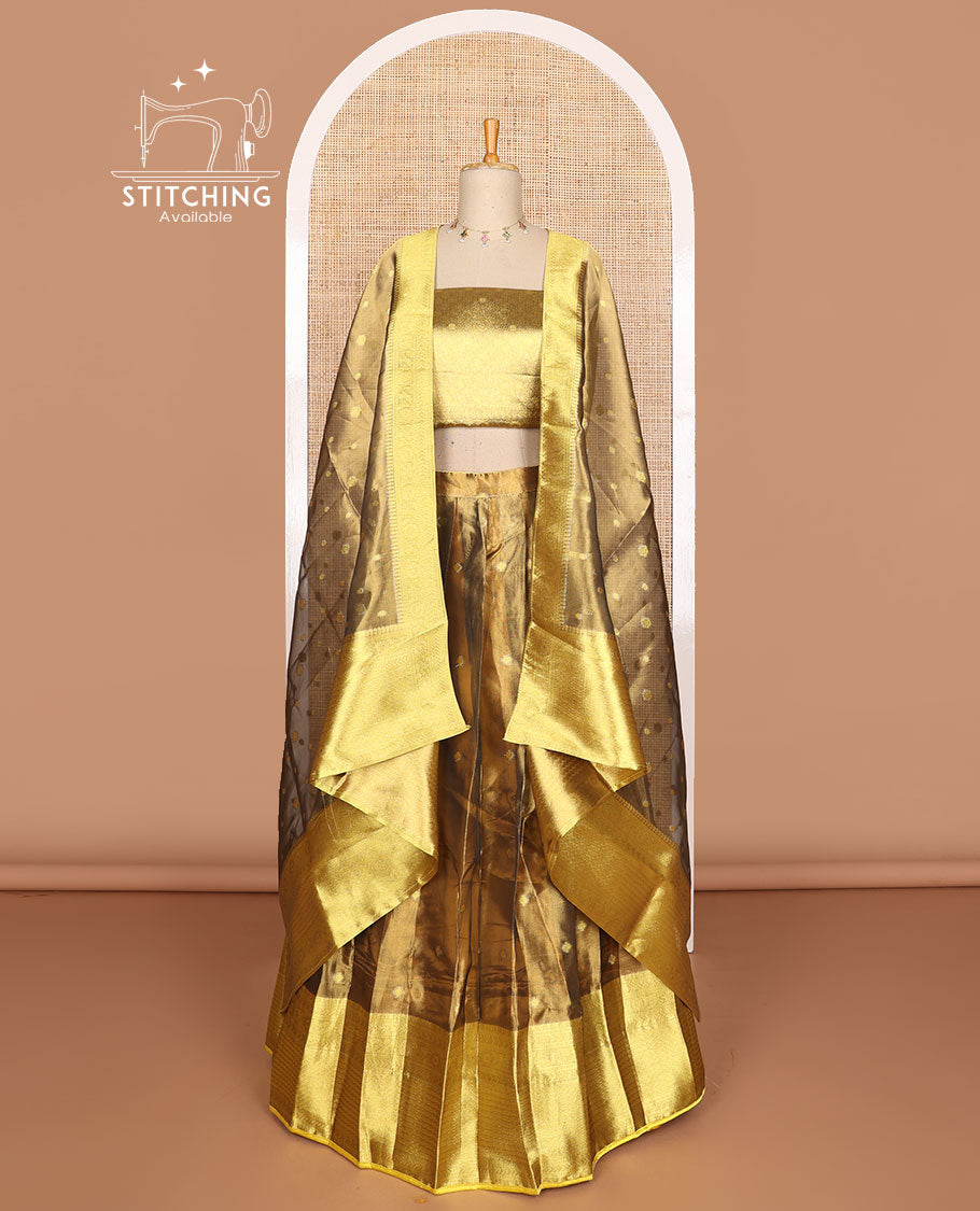 Bronze color buttas tissue half saree with contrast zari design border, zari design blouse & floral design dhavani