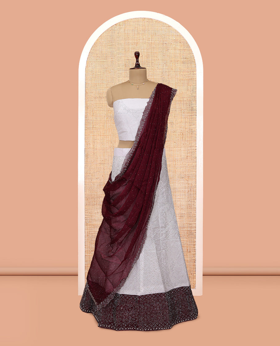 Off-white Banarasi Half-Saree, Finely Crafted with Bead Work Skirt, a Contrast Stone Work Border, Matching Blouse, and Contrast Scallop Stone Work Dupatta