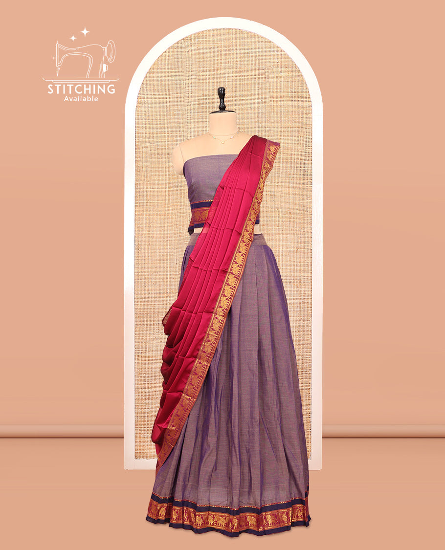 Grey Cotton Half-Saree Features Plain Skirt, a Contrast Elephant Zari Border, a Matching Blouse, and a Contrast Dhavani