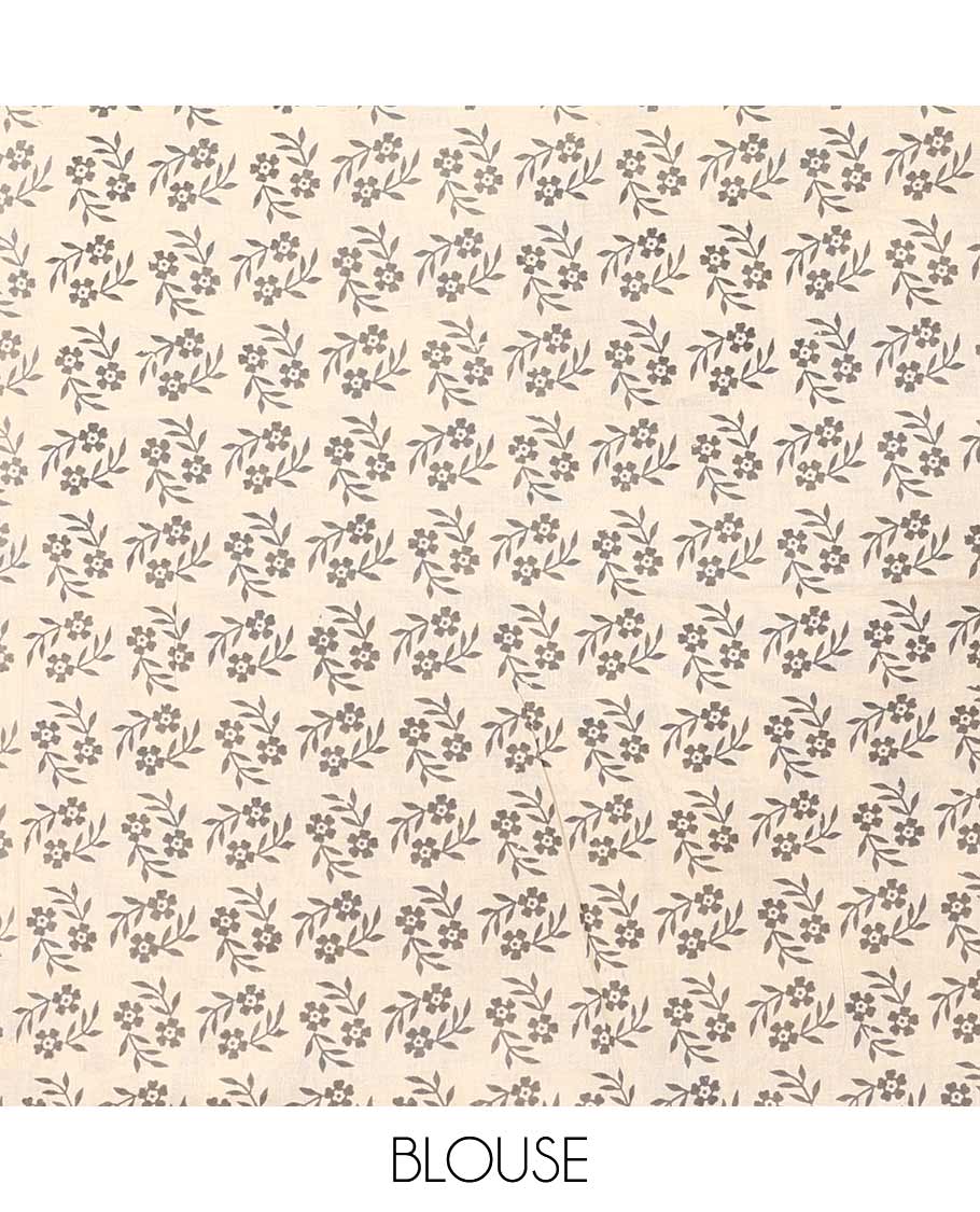 Black floral machine-printed Kalamkari cotton saree, contrast village printed border, and pallu of peacock print