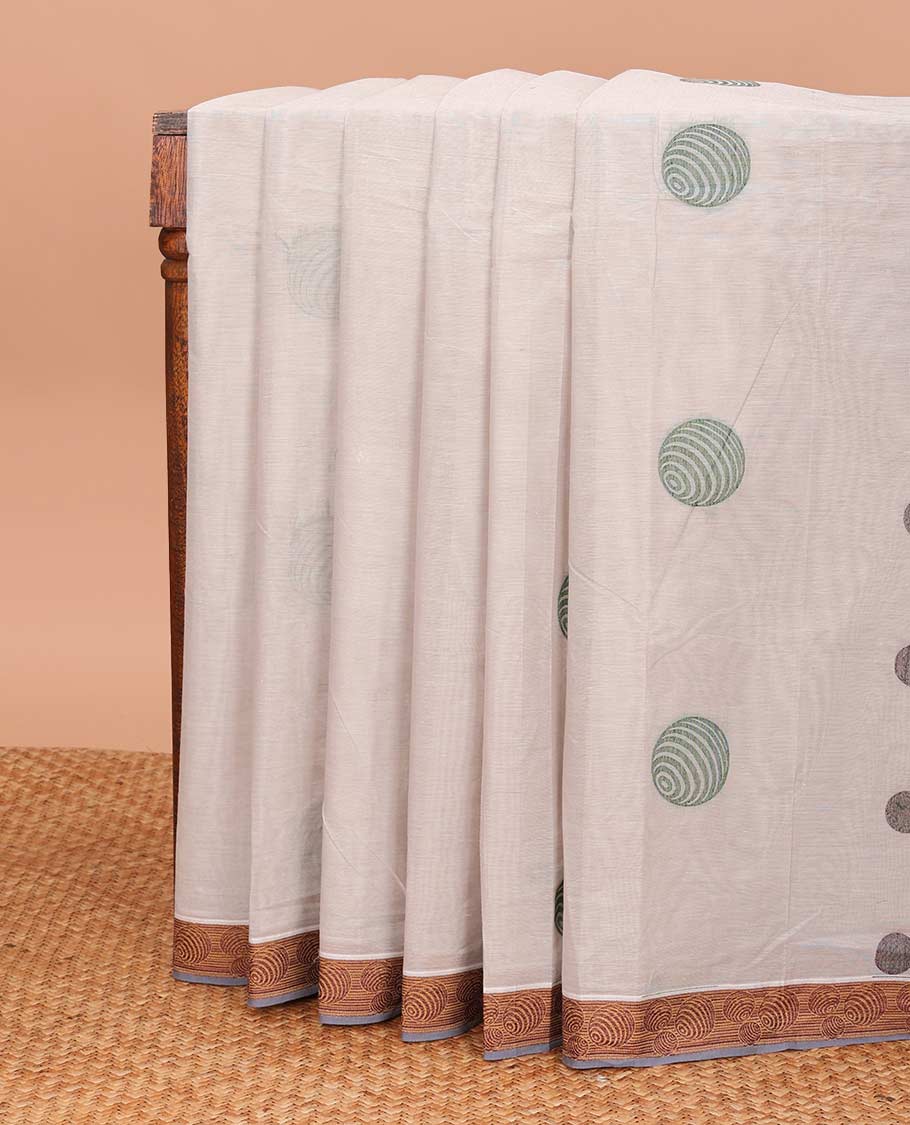 Half-white geometric motifs printed Coimbatore cotton saree, contrast geometric border, and leaf motif pallu