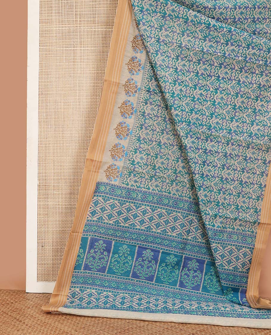 Blue intricately printed chanderi cotton saree, contrast traditional motifs with thread embroidered floral bouquet, and printed pallu