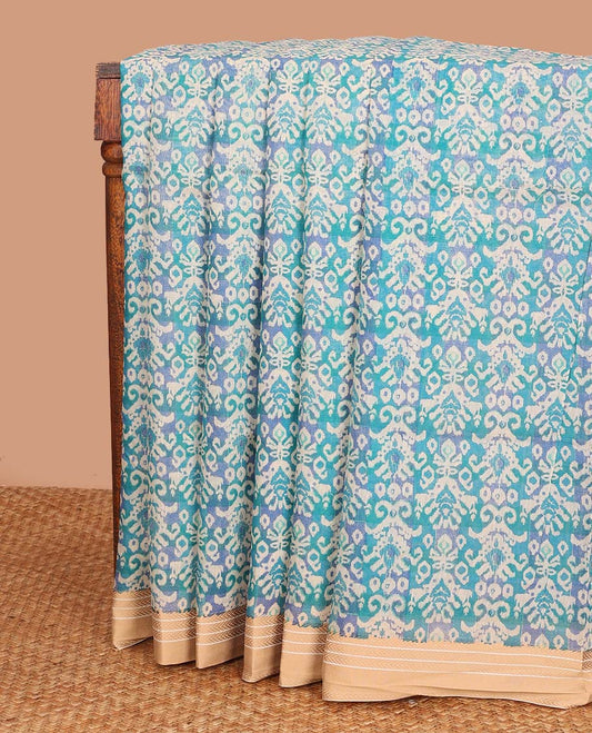 Blue intricately printed chanderi cotton saree, contrast traditional motifs with thread embroidered floral bouquet, and printed pallu