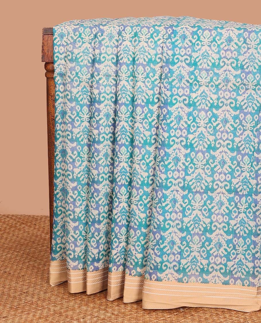 Blue intricately printed chanderi cotton saree, contrast traditional motifs with thread embroidered floral bouquet, and printed pallu