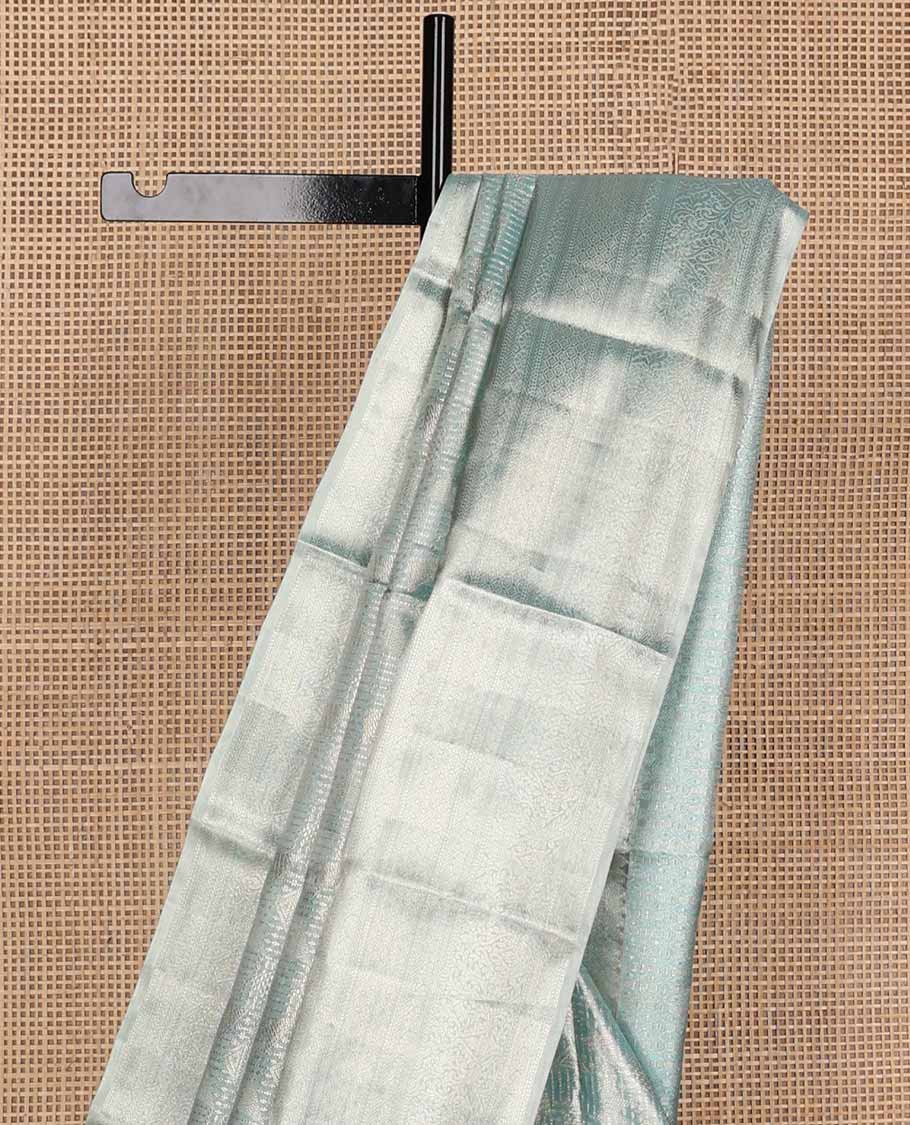 Blue jacquard tissue silk saree, intricate pallu & zari border of thilakam mokku,muthu,kathir, floral & then kuli kann