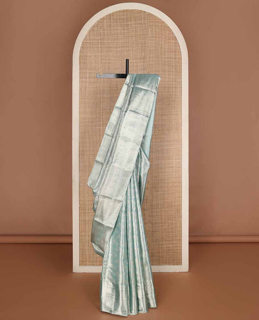 Blue jacquard tissue silk saree, intricate pallu & zari border of thilakam mokku,muthu,kathir, floral & then kuli kann