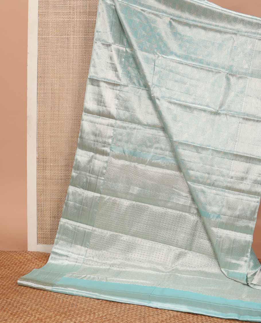 Blue jacquard tissue silk saree, intricate pallu & zari border of thilakam mokku,muthu,kathir, floral & then kuli kann